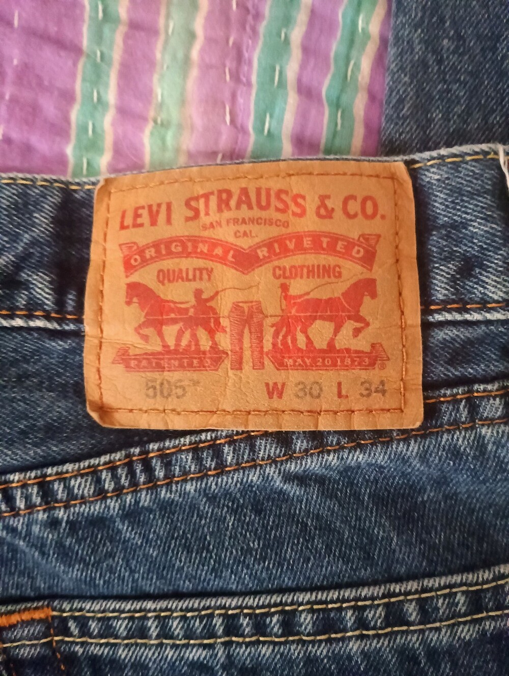 Levi's Men’s 505 Relaxed Fit Jeans in Blue with Tan Patch